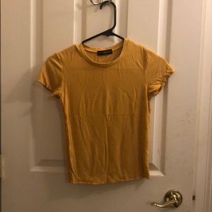 Girls top mustard yellow rubbed T-shirt